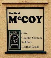 A sign outside McCoy's Saddlery, Porlock, Somerset