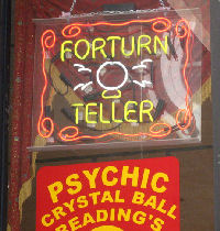 An illuminated sign that reads 'forturn teller'