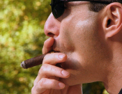 A man smoking a ciger
